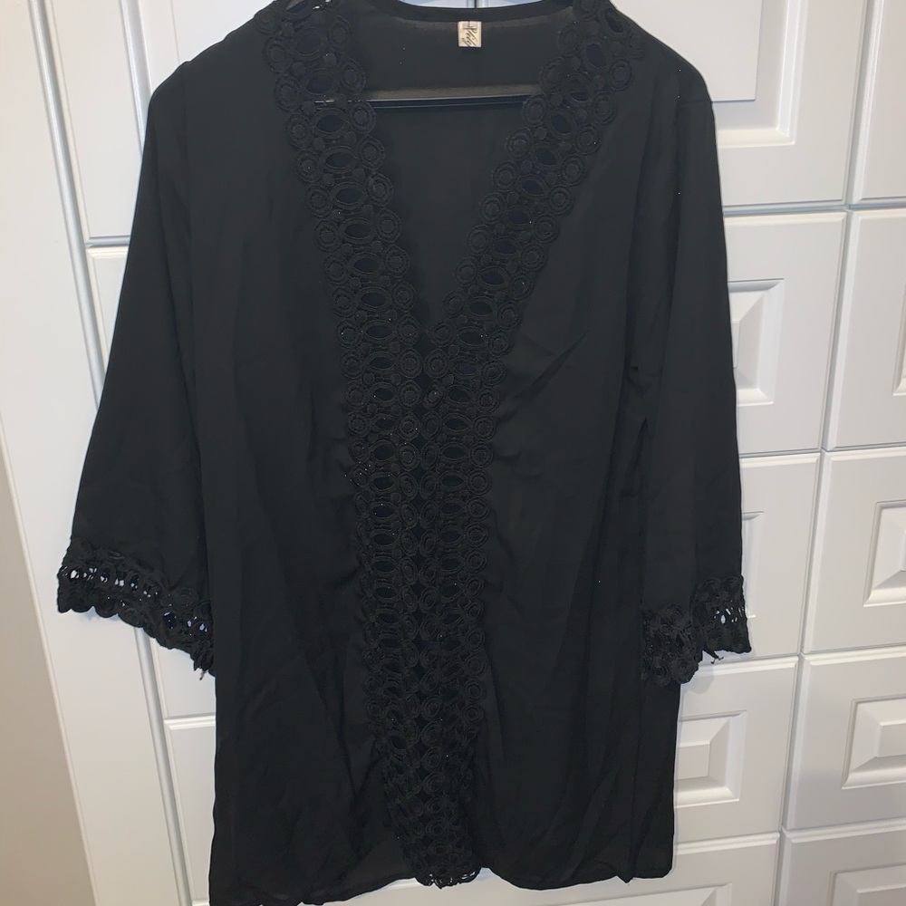 Black swim coverup with lace details